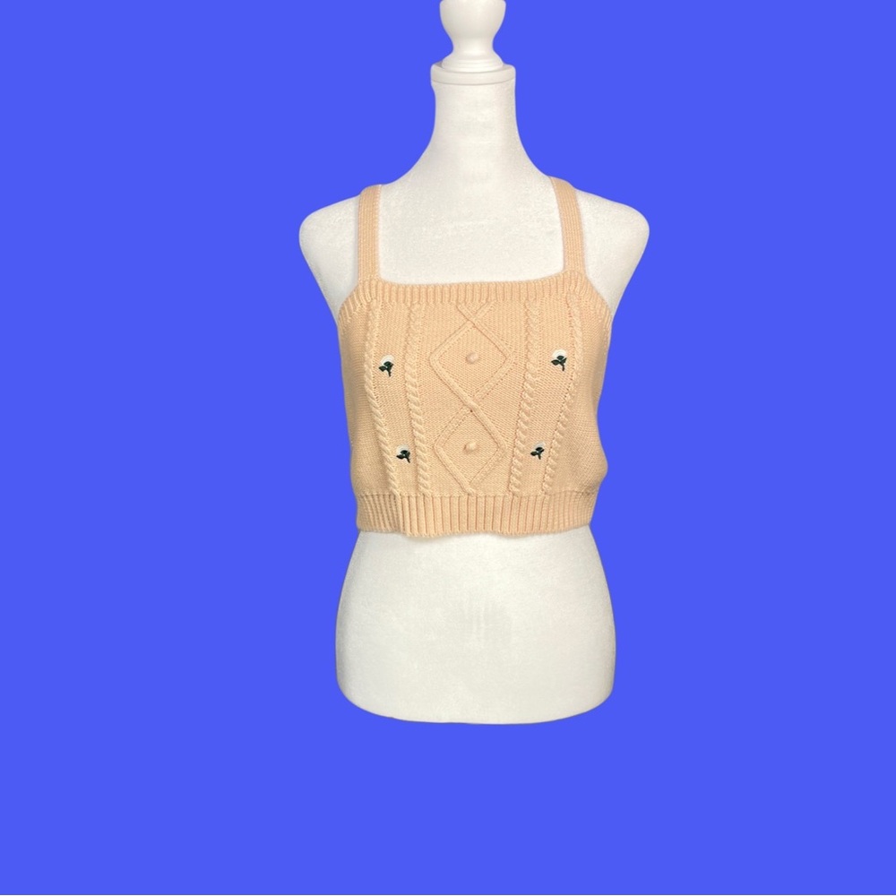 Light Pink Knit crop top with small flower embroidery.